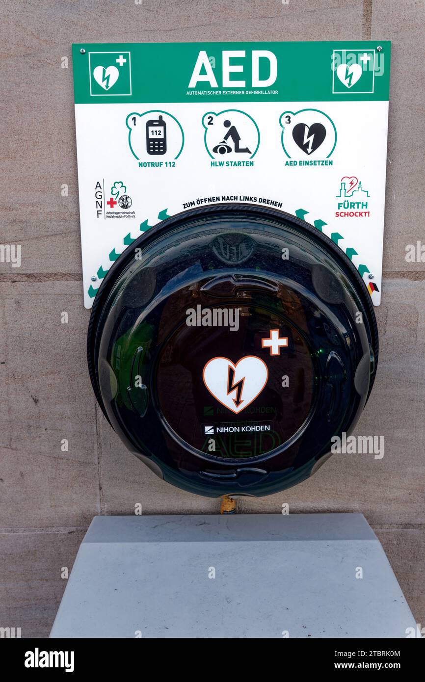 First aid for cardiac infarction public defibrillator Stock Photo Alamy