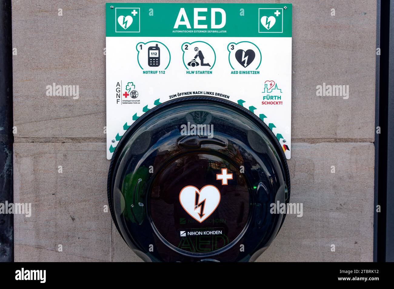 First aid for cardiac infarction public defibrillator Stock Photo Alamy