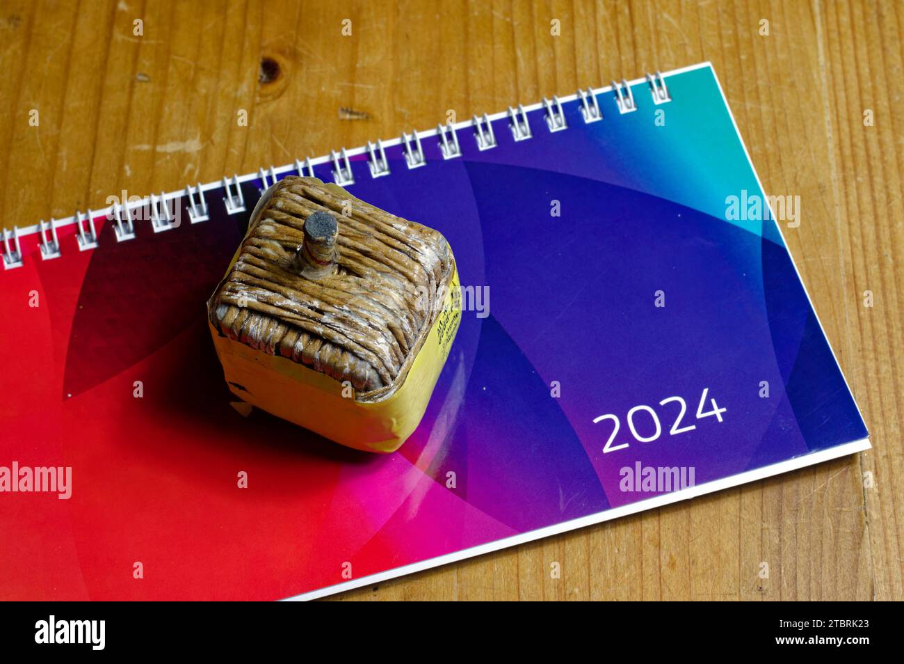 Symbolic image: New Year, calendar for 2024 with fireworks Stock Photo