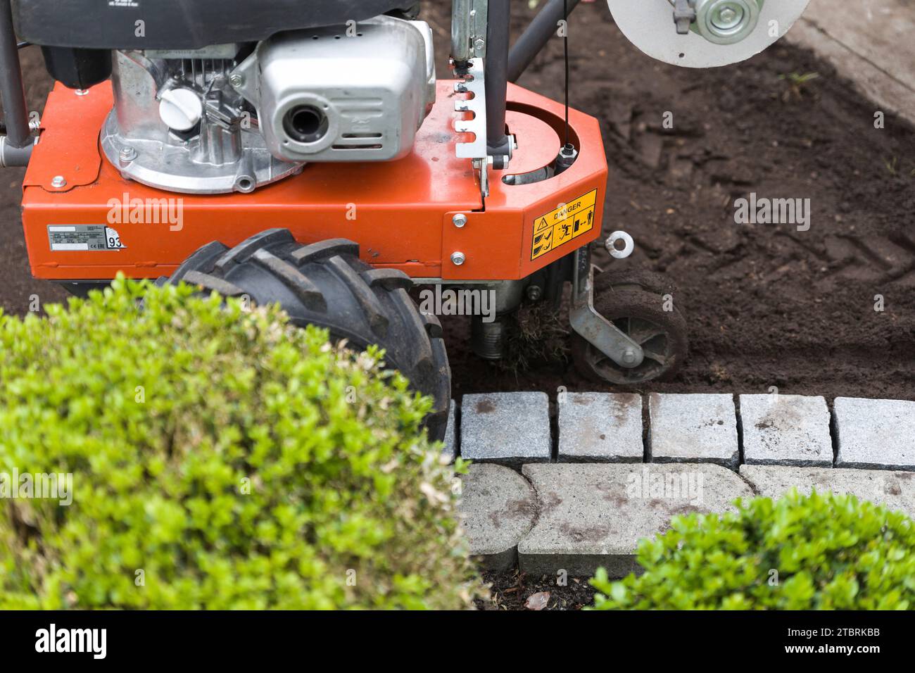 Cable laying machine for robotic lawnmowers Stock Photo