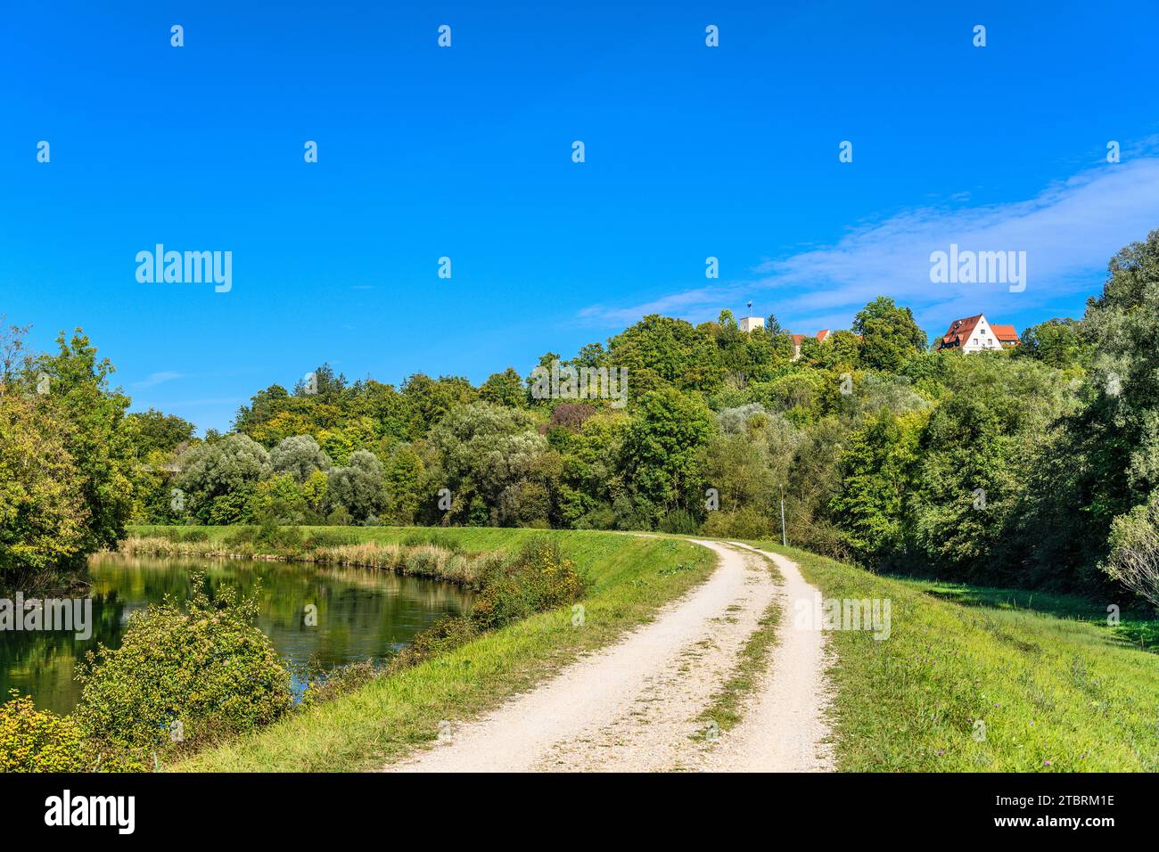 Germany, Bavaria, District of Munich, Grünwald, Isar Valley, Isar Canal with Grünwald Castle and Castle Hotel Stock Photo