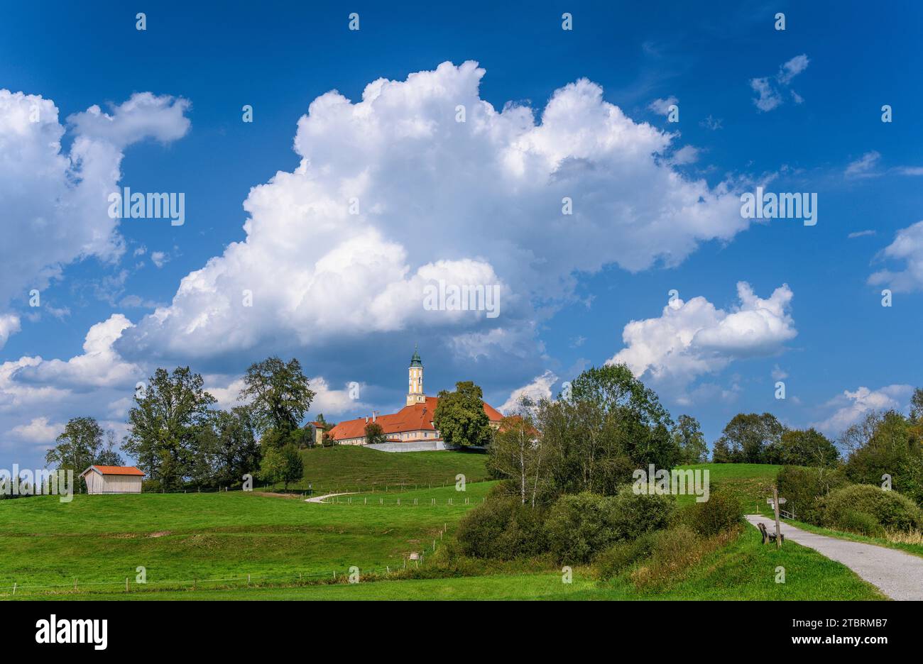 Germany, Bavaria, Tölzer Land, Sachsenkam, Cultural landscape with Reutberg Monastery Stock Photo