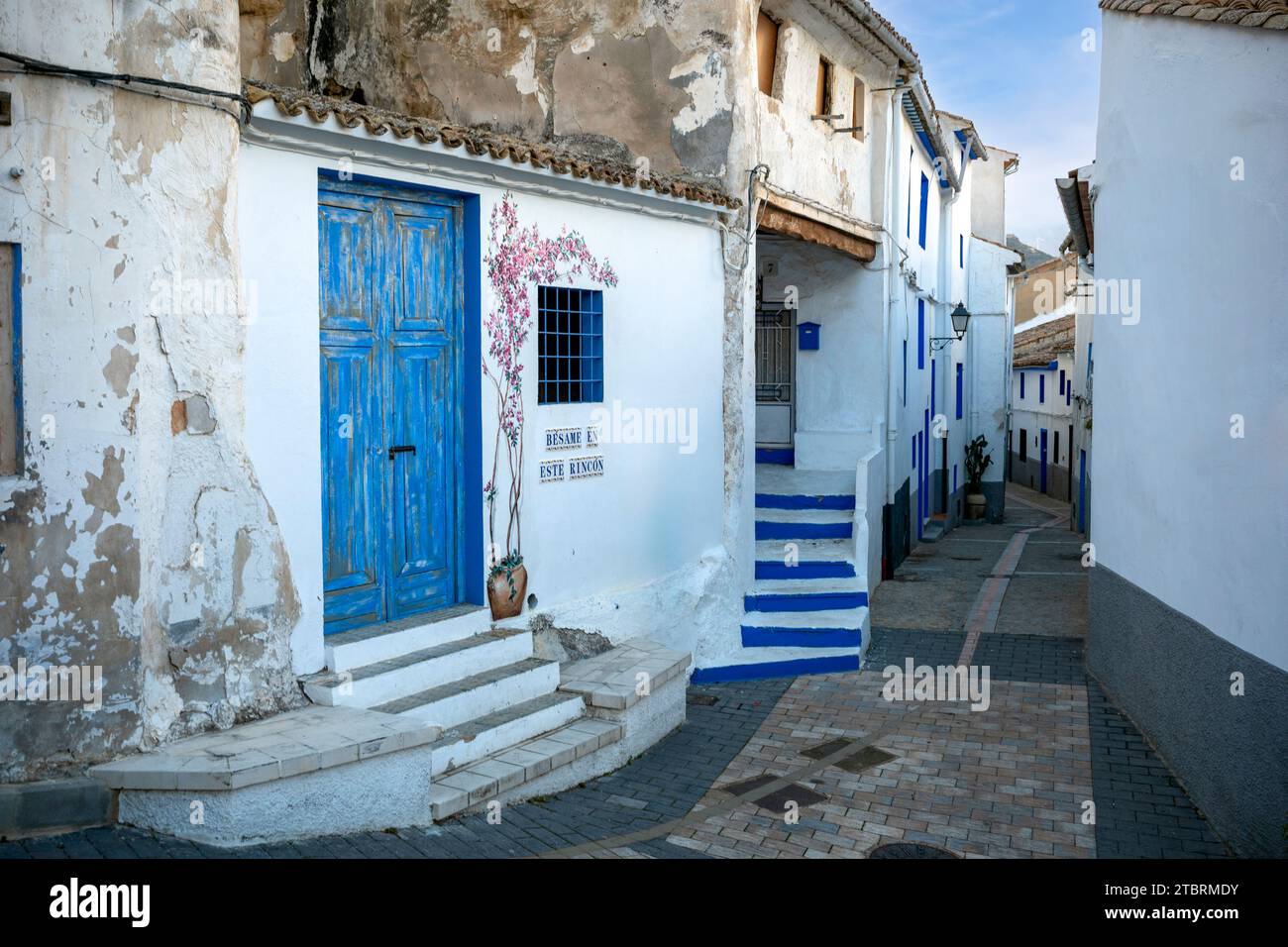 Typical alley with the famous kissing corner of the town of Ayora, in Valencia, Spain Stock Photo