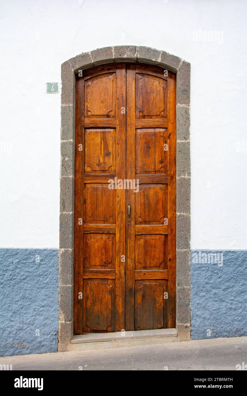Old wooden door on a house on the Canary Island of Gran Canaria in Spain Stock Photo