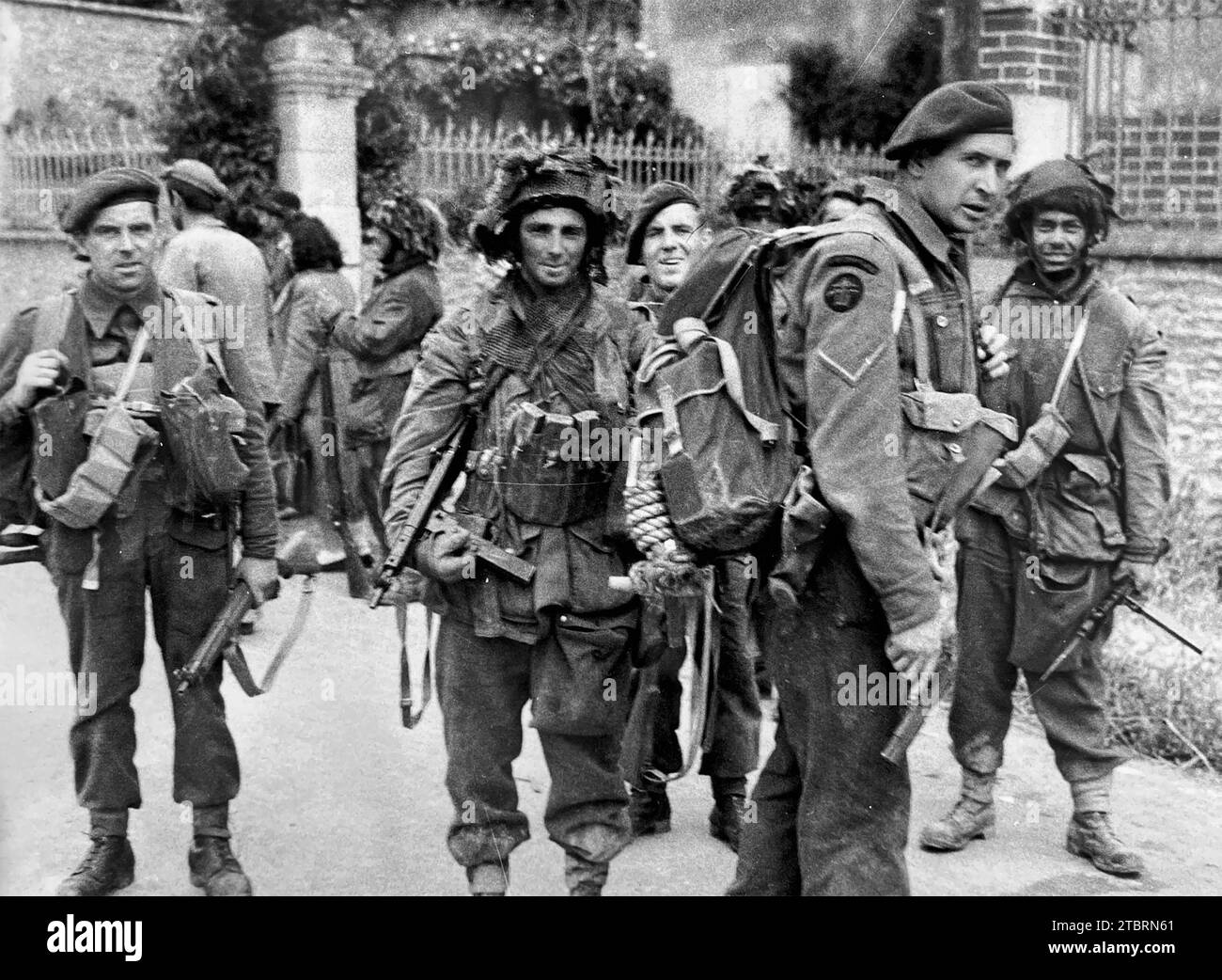 OPERATION OVERLORD  June 1944.  Men of No 4 Commando in Ranville on 6th June 1944. Ranville was the first French village liberated on D-Day. Stock Photo