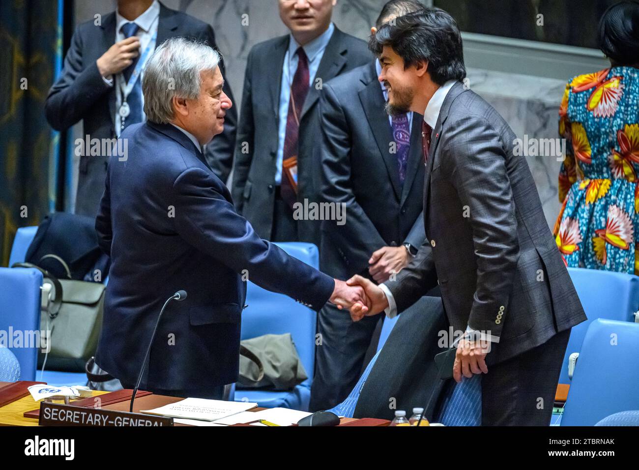 New York, USA, 8th Dec. 2023. Ambassador José de la Gasca of Ecuador, president of the Security Council in December (R) greets United Nations Secretary-General Antonio Guterres before the start of a meeting of the UN Security Council on the situation in the Middle East, including the Palestinian question. Credit: Enrique Shore/Alamy Live News Stock Photo