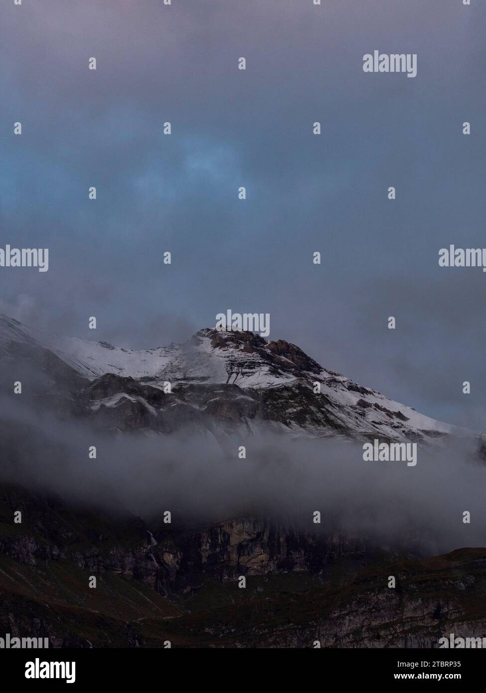 The mountains near Kandersteg, shrouded in clouds Stock Photo - Alamy