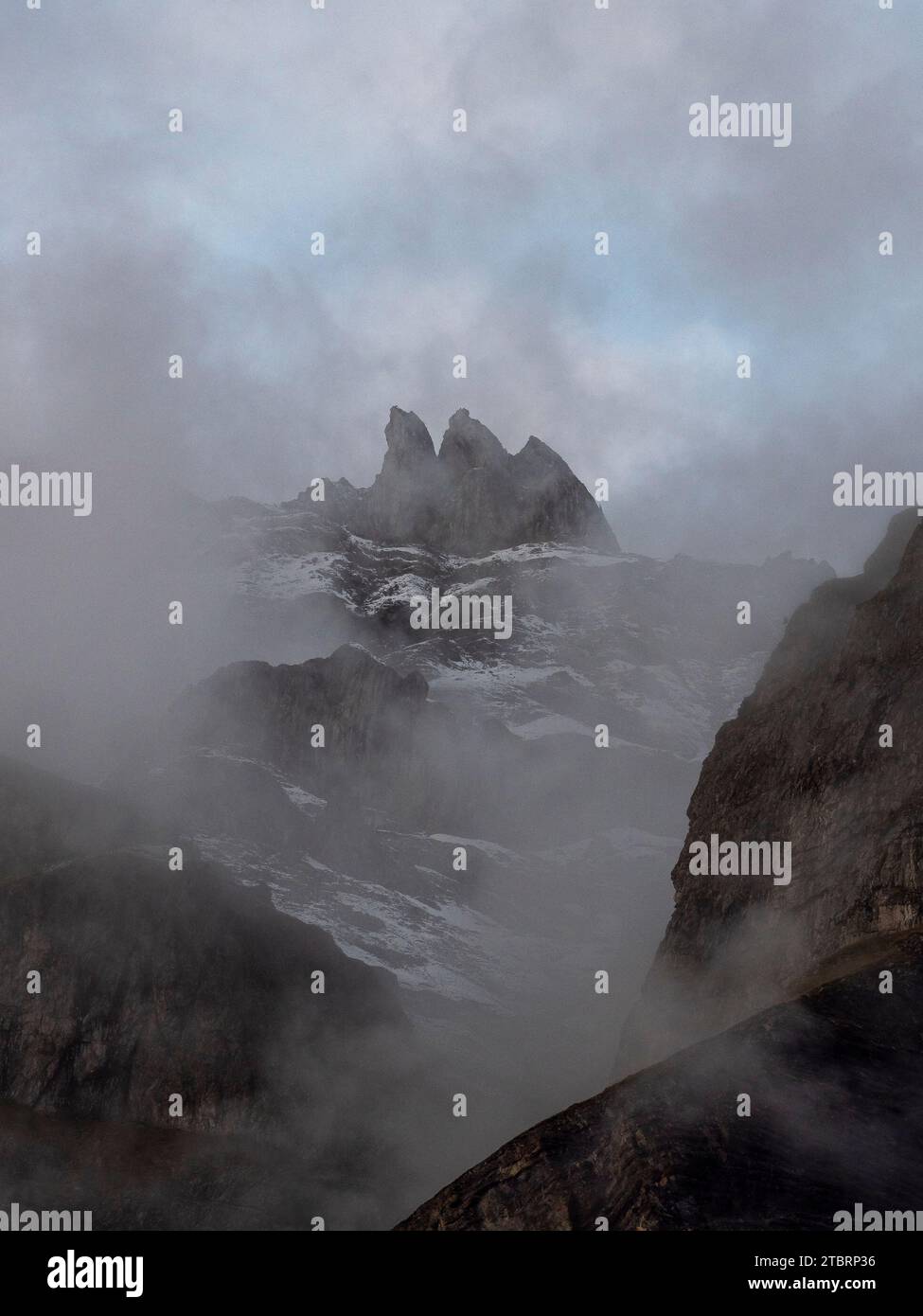 The mountains near Kandersteg, shrouded in clouds Stock Photo - Alamy