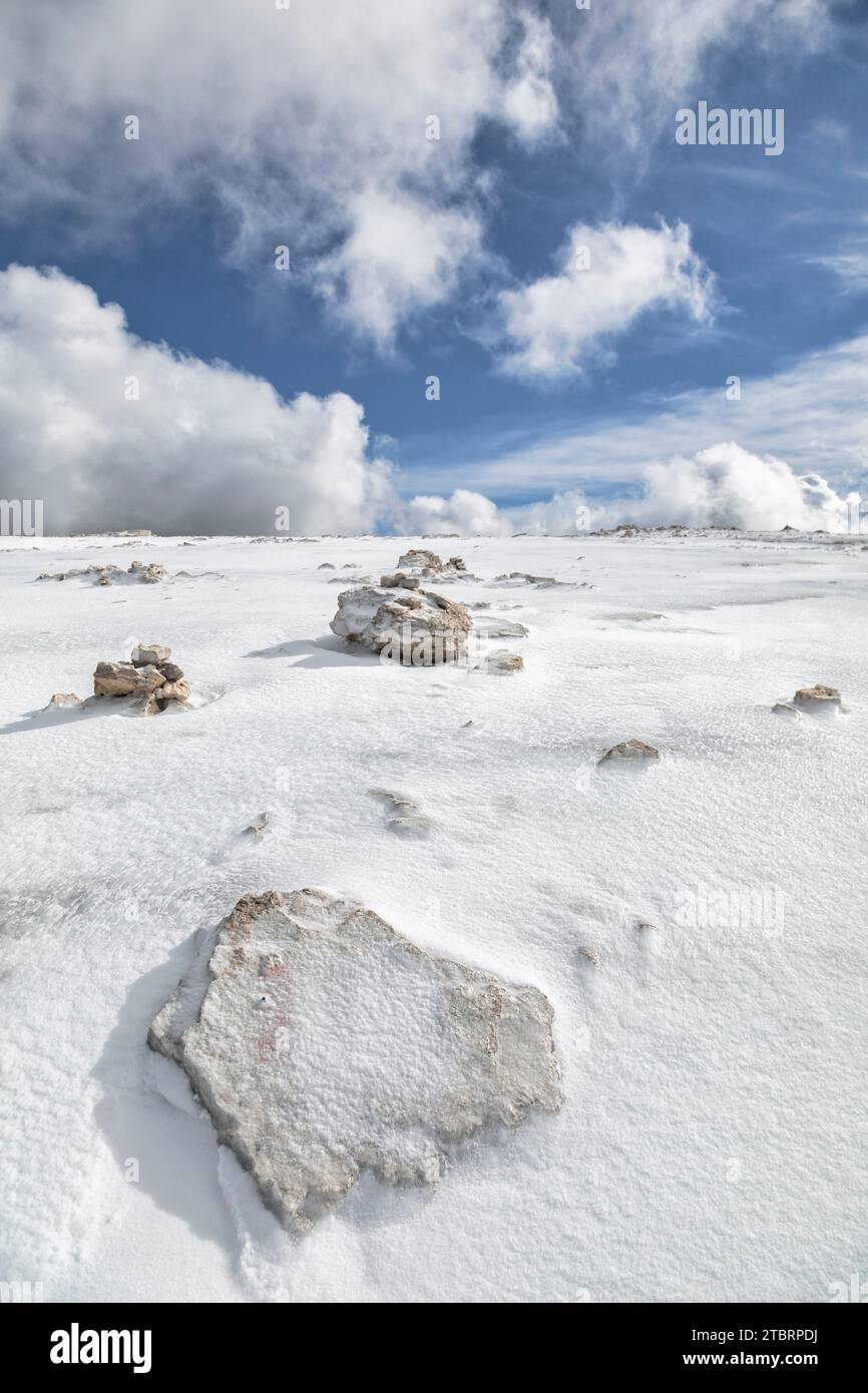 Italy, Trentino, district of Trento, municipaity of Canazei, Sella mountain group, summit plateau of Sass Pordoi covered by frozen snow, desert landscape in the Dolomites Stock Photo