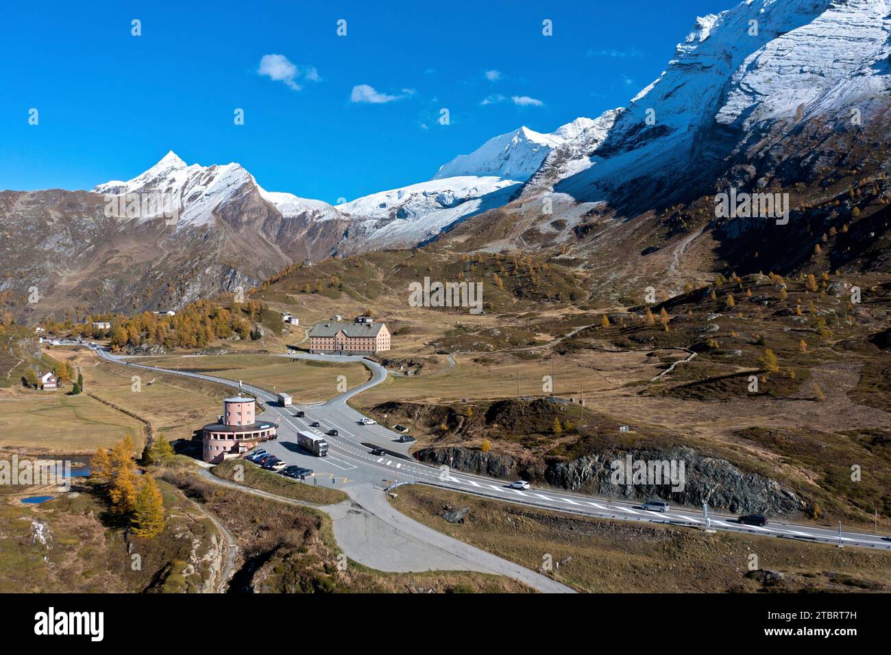 Autumn on the Simplon Pass with the Hotel Monte-Leone, behind the Simplon Hospice, Simplon, Valais, Switzerland Stock Photo