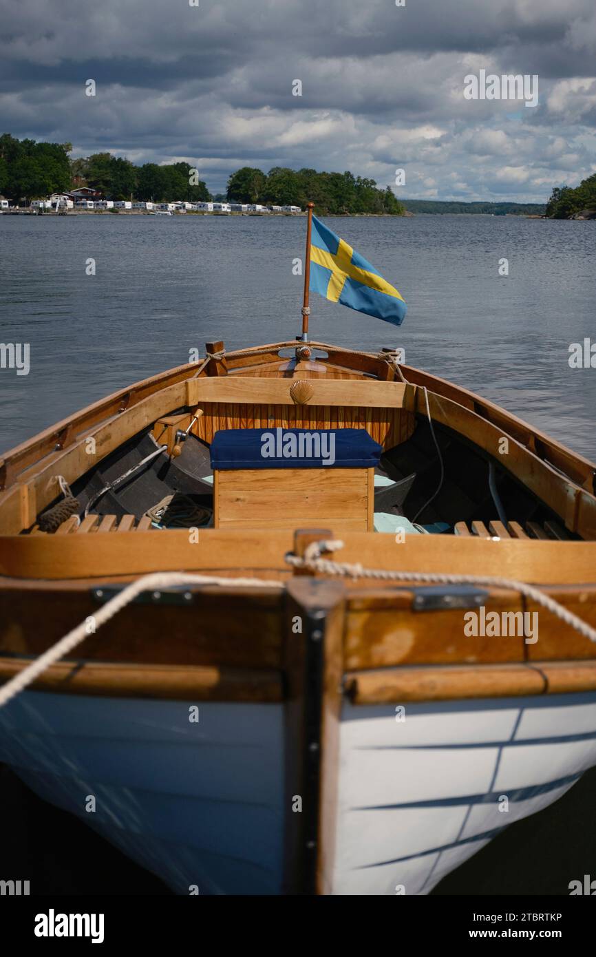 Rowing boat with Swedish flag, Karlskrona, Sweden Stock Photo