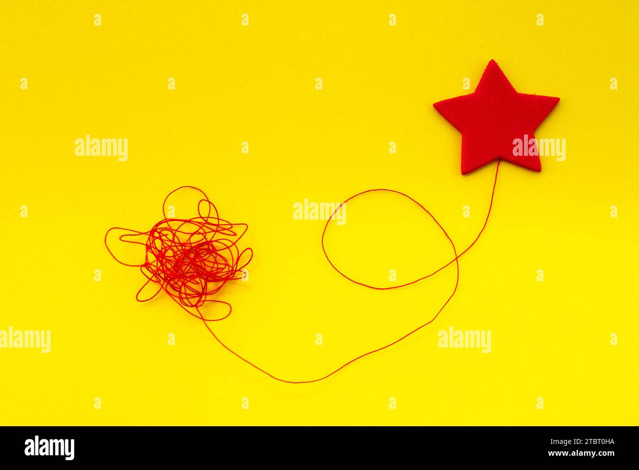 Tangled red ribbon hi-res stock photography and images - Alamy