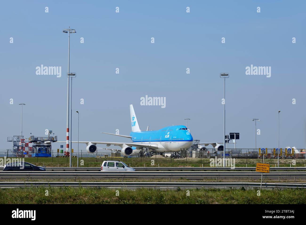 Airplane and highway A4, Amsterdam-Schiphol Airport, North Holland, Netherlands Stock Photo