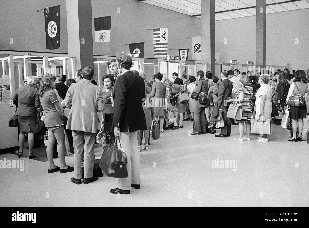 New arrival of visitors lining up at customs checkpoint, John F. Kennedy International Airport, Jamaica, Queens, New York City, New York, USA, Warren K. Leffler, U.S. News & World Report Magazine Photograph Collection, June 24, 1971 Stock Photo