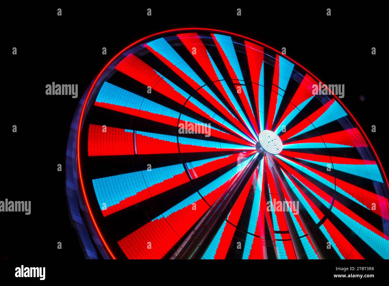 Low View Glowing Ferris Wheel in Motion at Tennessee Night Festival