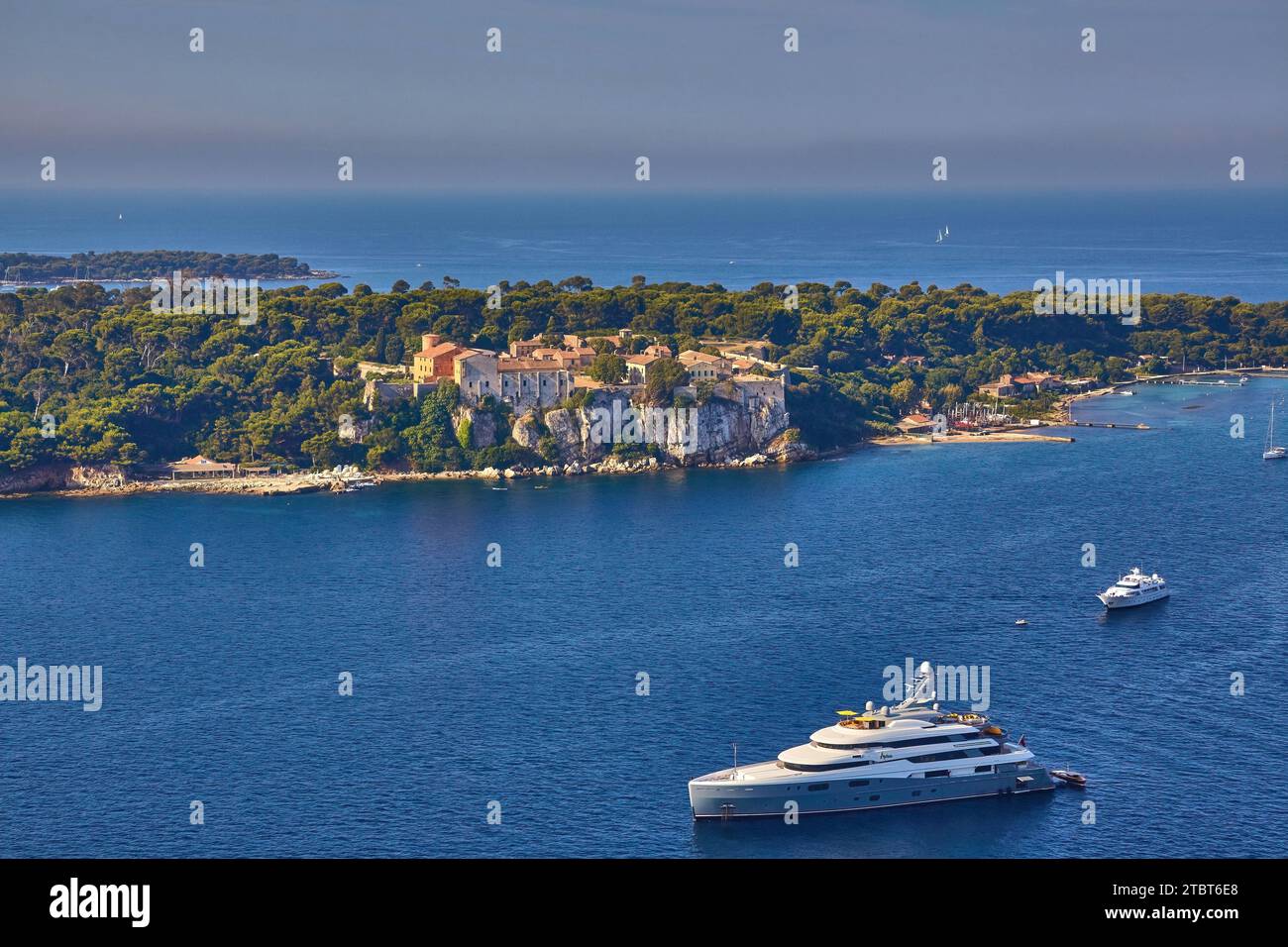 Aerial view of Fort Royal on Ile Saint-Marguerite in the bay of Cannes with superyacht AVIVA at anchor. Stock Photo