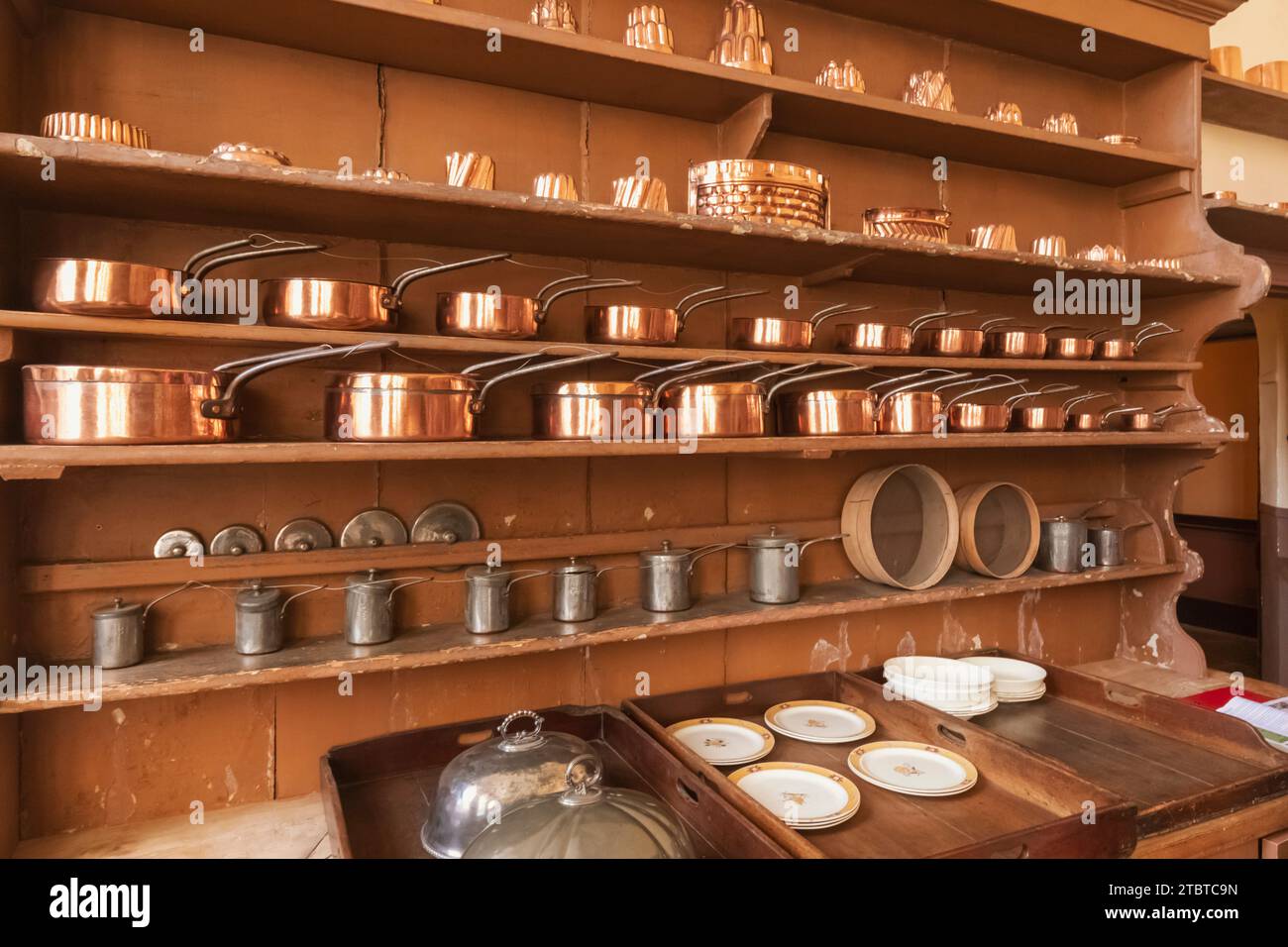 England, West Sussex, Petworth, Petworth House, The Servants Quarters, The Kitchen, Display of Kitchenware Stock Photo