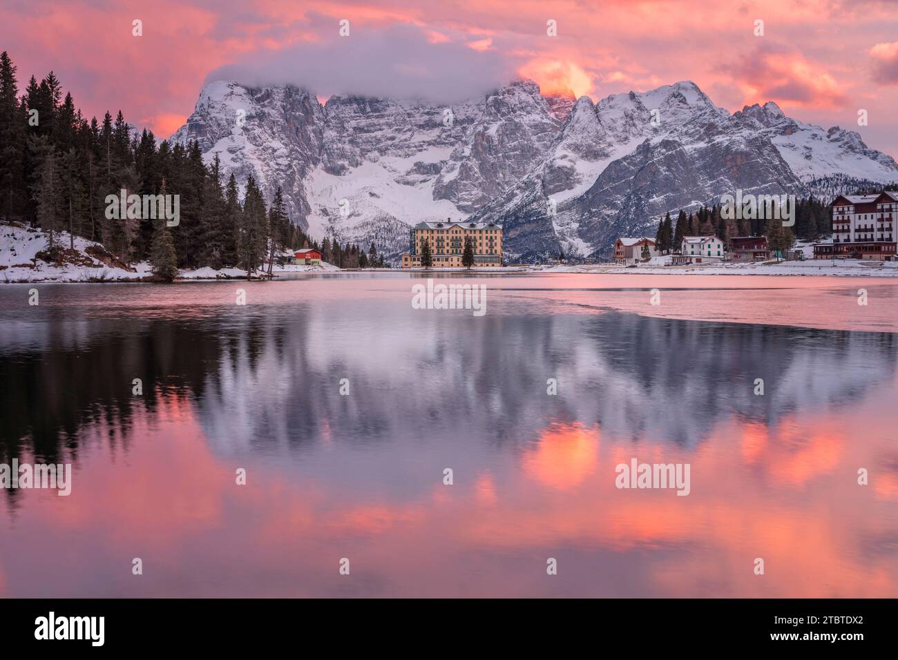 Italy, Veneto, province of Belluno, Auronzo di Cadore, iconic view of Misurina with the lake and mount Sorapis in background, breathtaking sunset, Dolomites Stock Photo