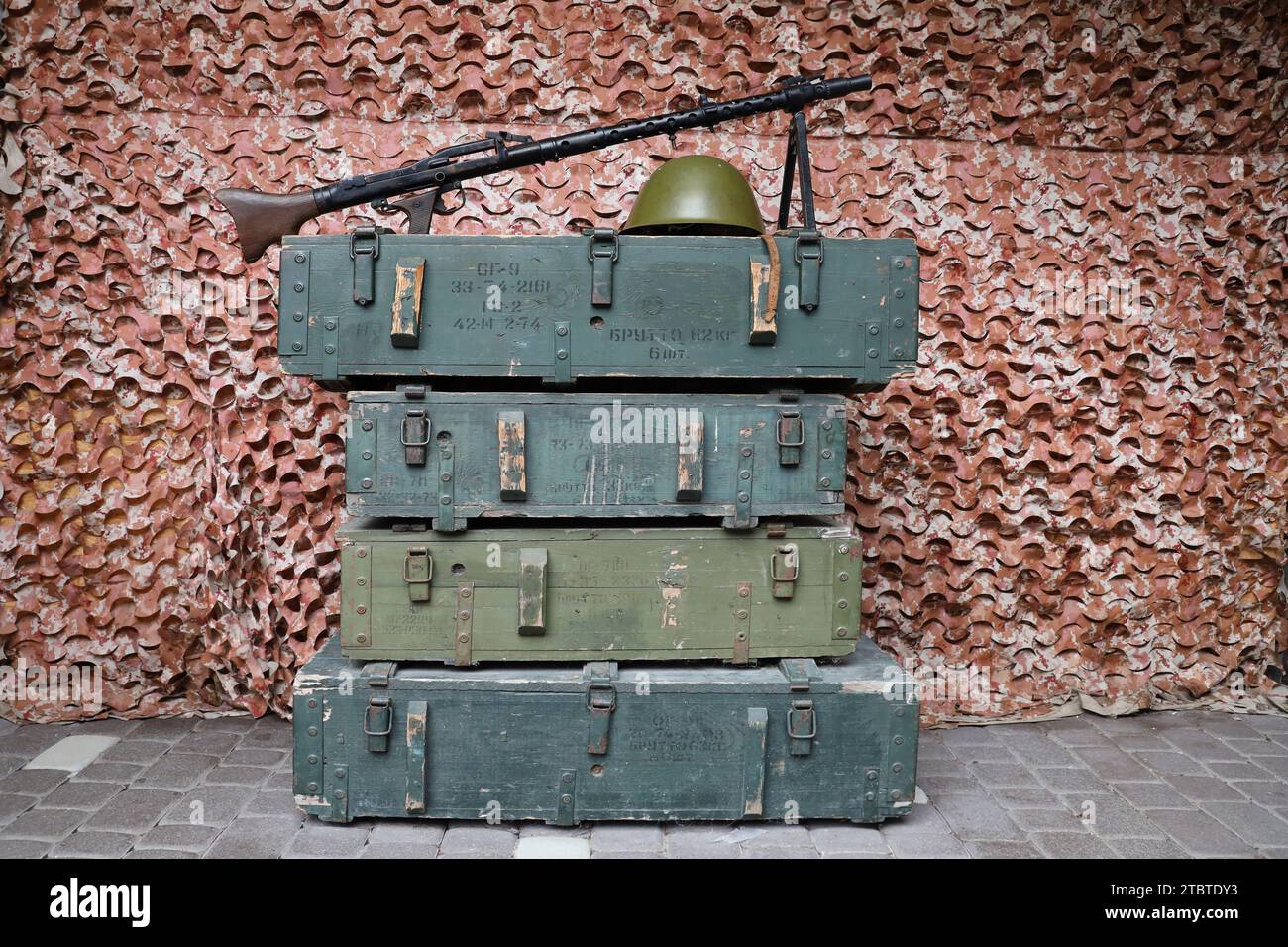 Soviet army ammunition stack of green crates with russian names of ammo ...