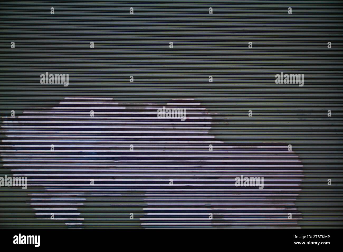 Silver Abstract Shape on Green Corrugated Metal Background Asset Stock Photo
