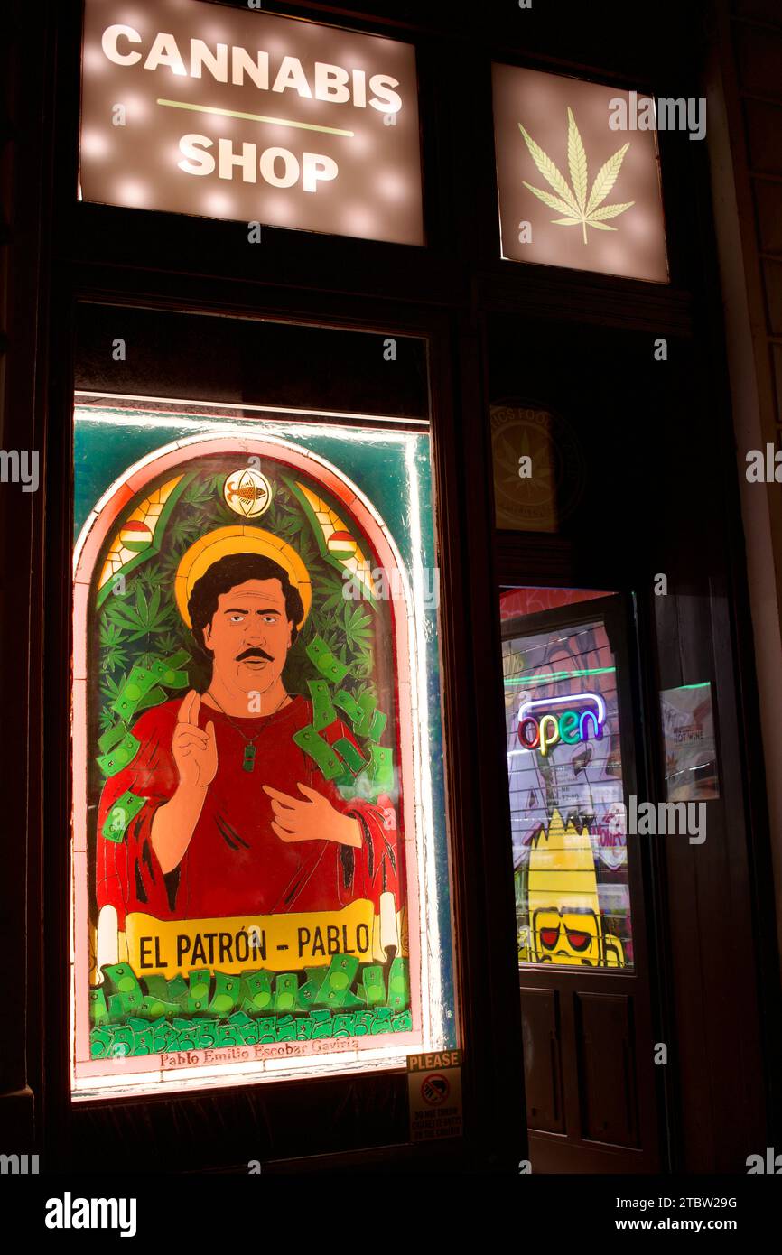 A cannabis shop in Prague, Czech Republic, with a colourful painting of Pablo Escobar 'El Patron' in the window Stock Photo