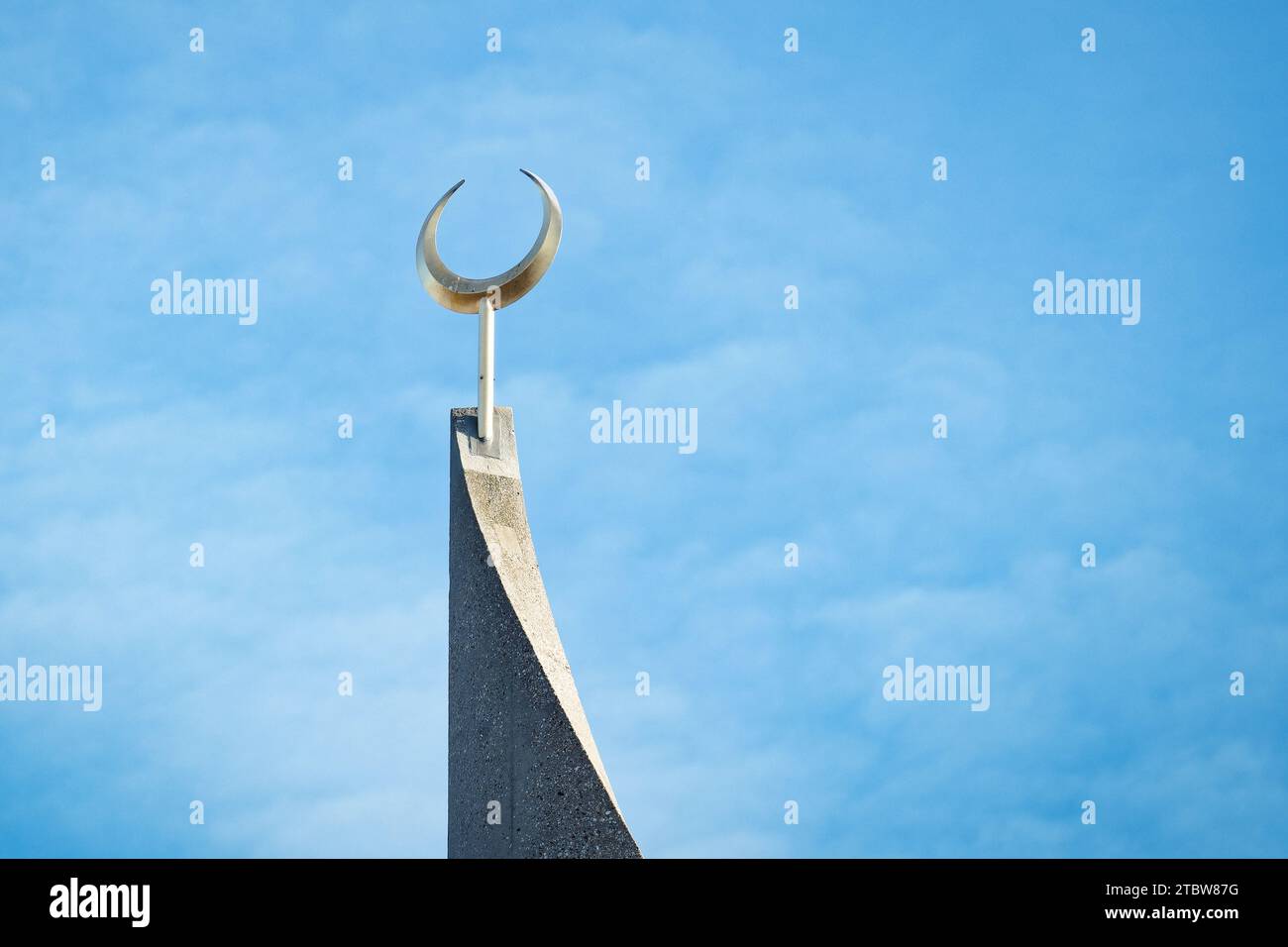 the golden crescent on one of the two minarets of the central mosque in cologne ehrenfeld Stock Photo