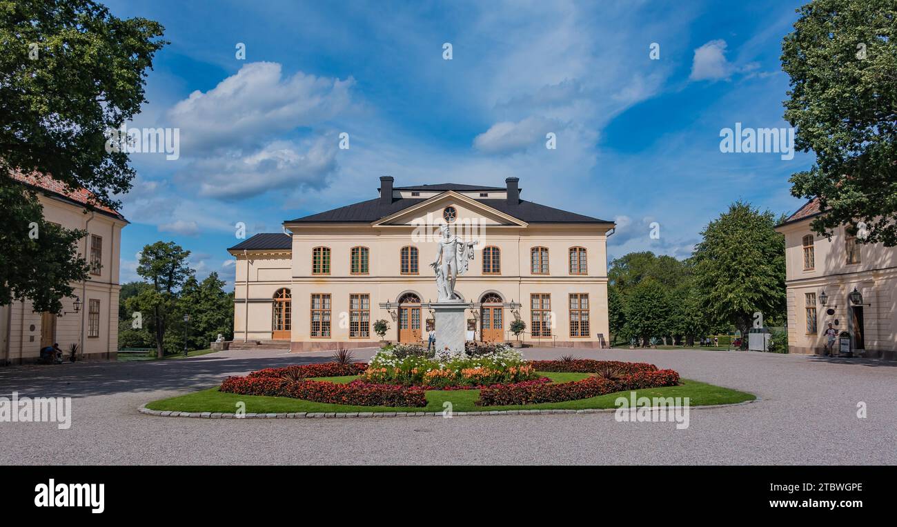 A picture of Drottningholms Slottsteater and the statue in front of it Stock Photo
