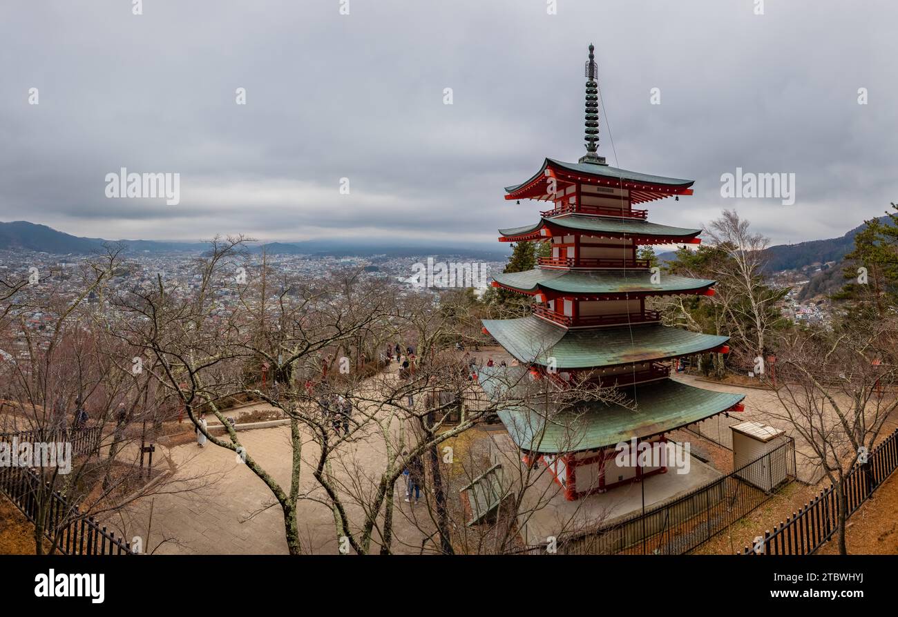 A panorama picture of the Chureito Pagoda overlooking the town of Kawaguchiko and Mt. Fuji (this one hidden by clouds) Stock Photo