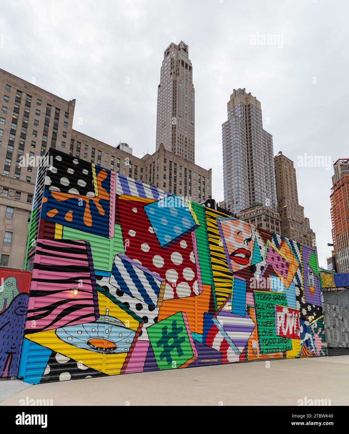 A picture of the colorful Mural Project next to the New York World ...