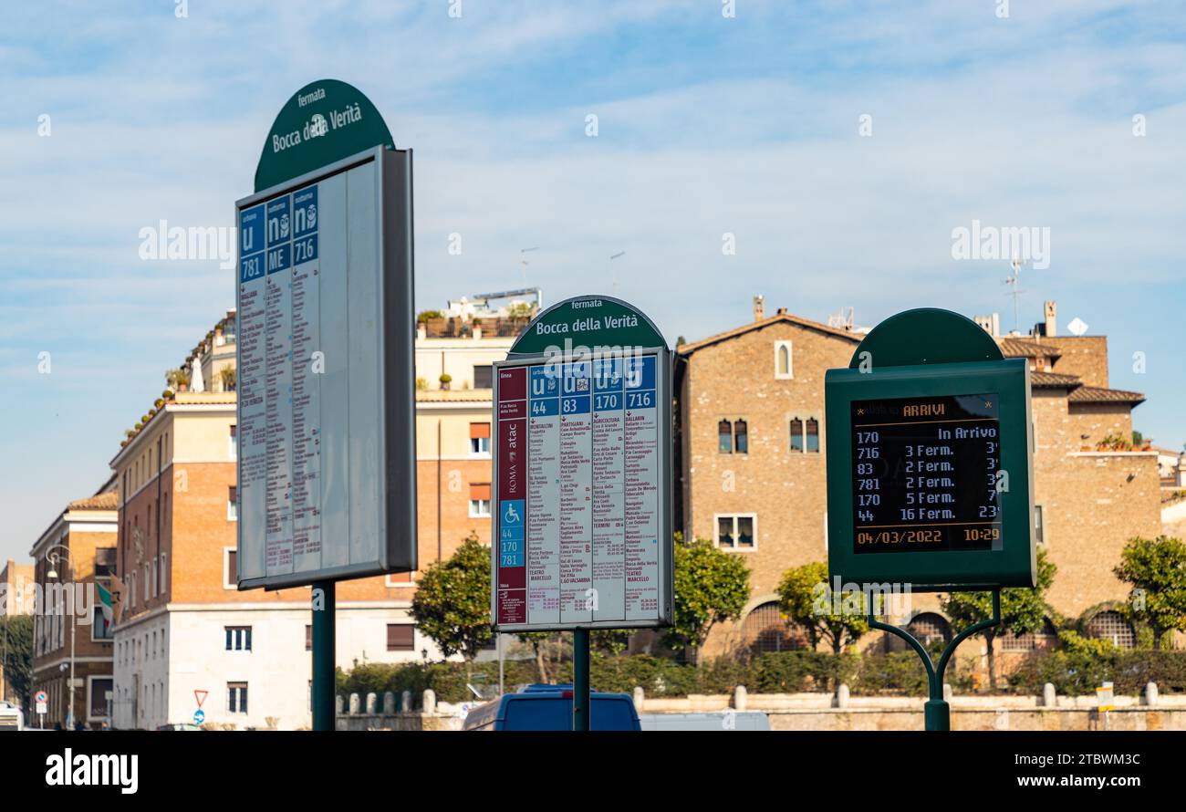 A picture of multiple timetables and display of a bus stop in Rome Stock Photo