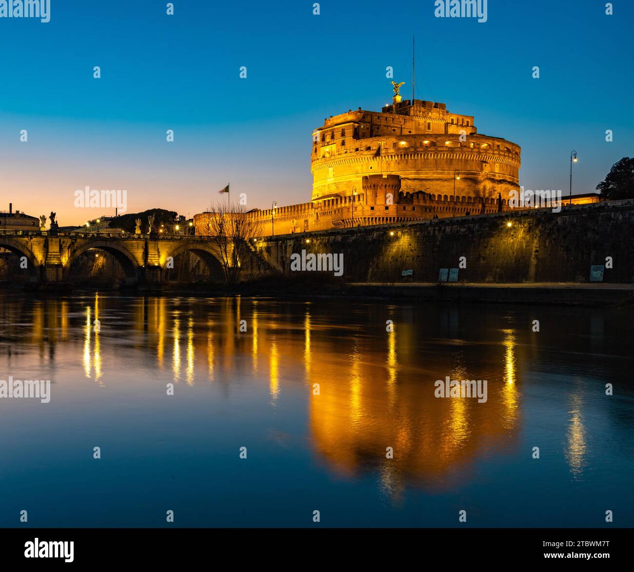 A picture of the Castel Sant'Angelo and the Tiber river at sunset Stock Photo
