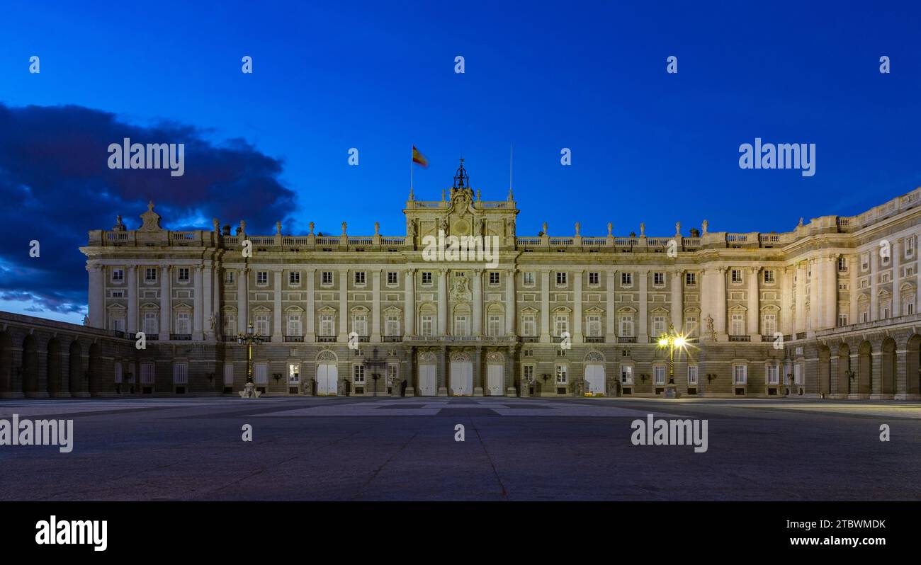 A picture of the Royal Palace of Madrid's main square, i.e. the Plaza de la (Armeria), at sunset or early evening Stock Photo