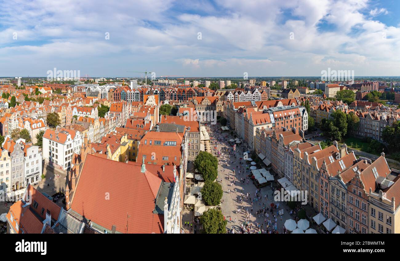A picture of the crowded Long Market in Gdansk, and the surrounding old town rooftops and architecture Stock Photo