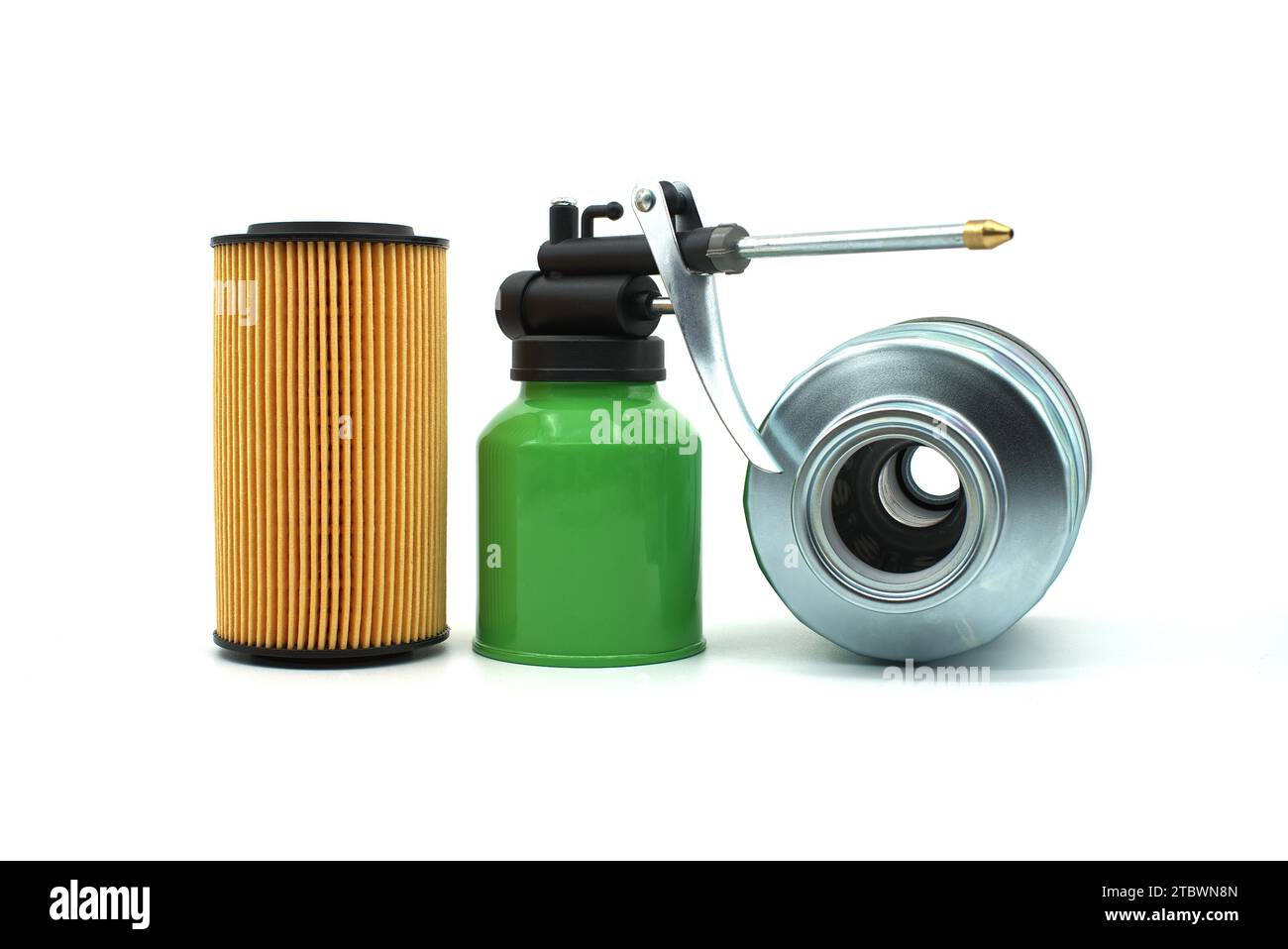 Vehicle engine oil filters and hand pump oiler isolated on a white