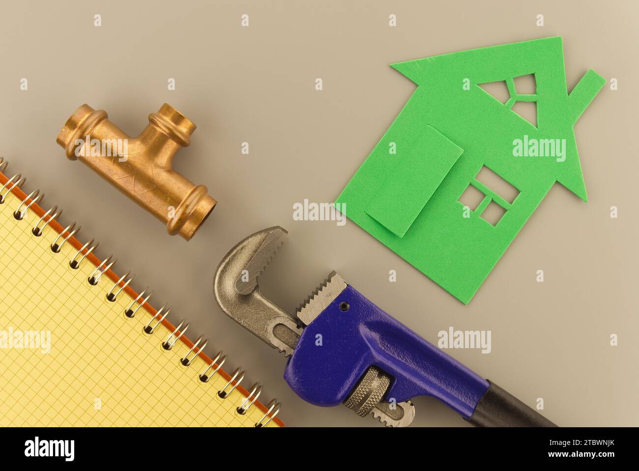 Renovation, pipeline repair or plumbing concept with wrench, copper