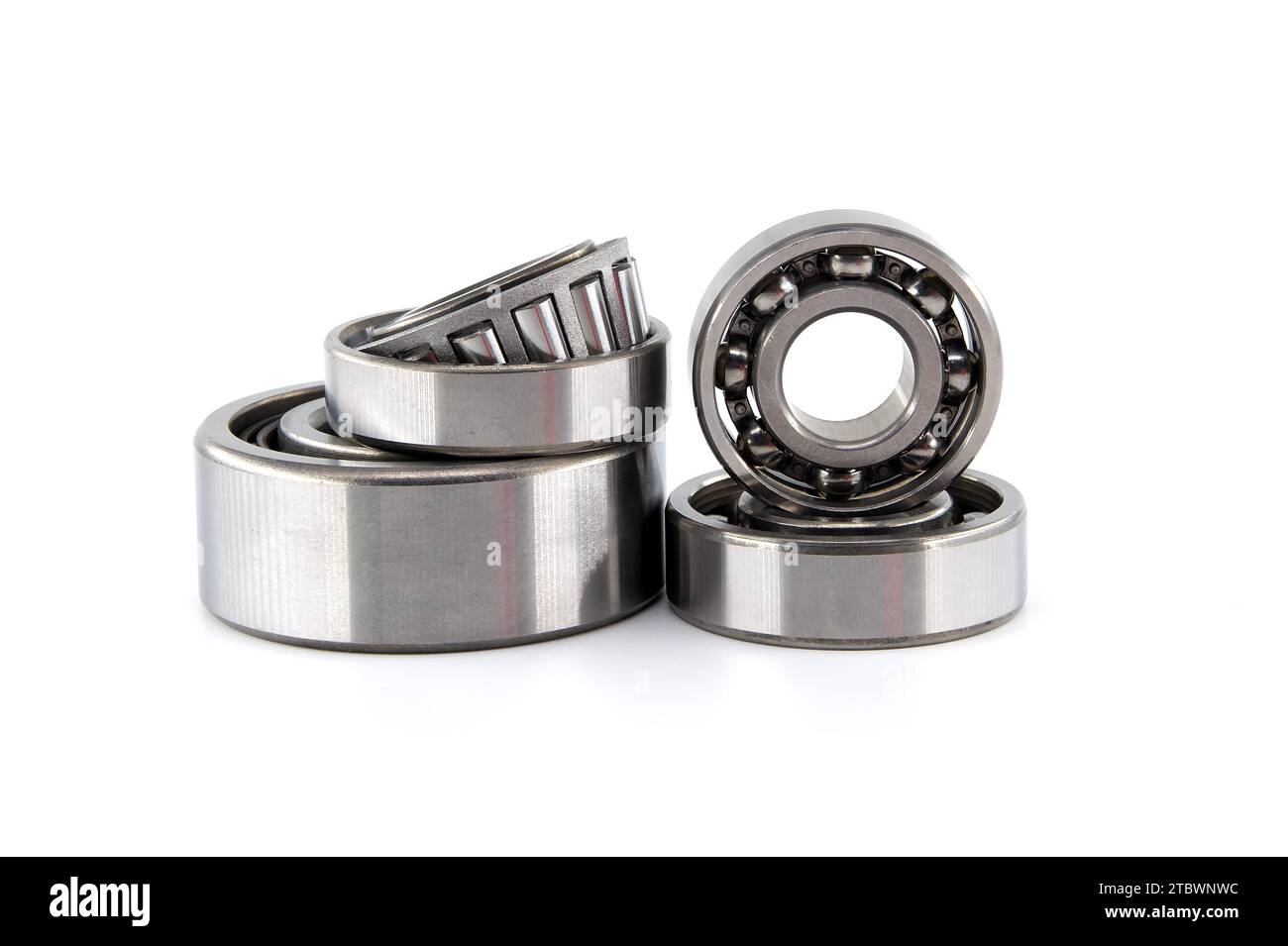 Set of various ball and roller bearings on white background. Car
