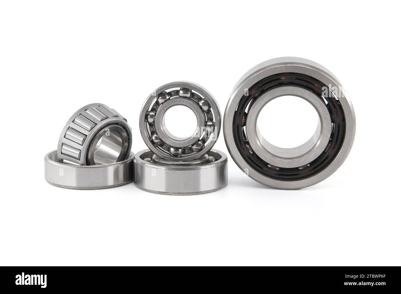 Set of various ball and roller bearings on white background. Car