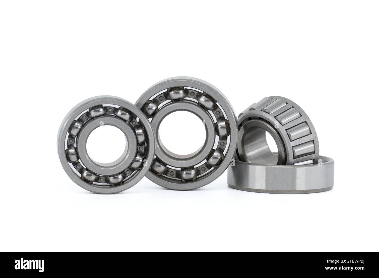 Set of various ball and roller bearings on white background. Car