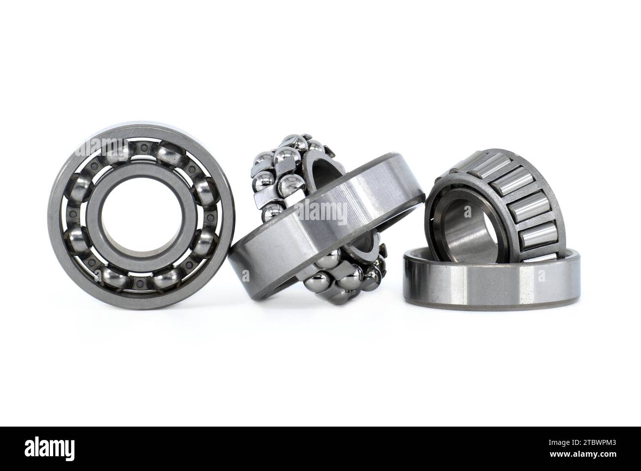 Set of various ball and roller bearings on white background. Car ...