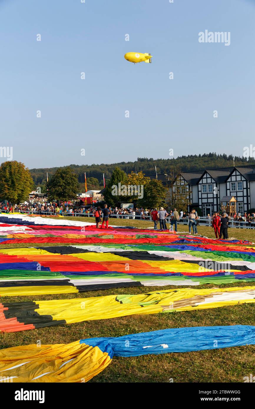 Hotair balloons, many balloon envelopes lying on the ground