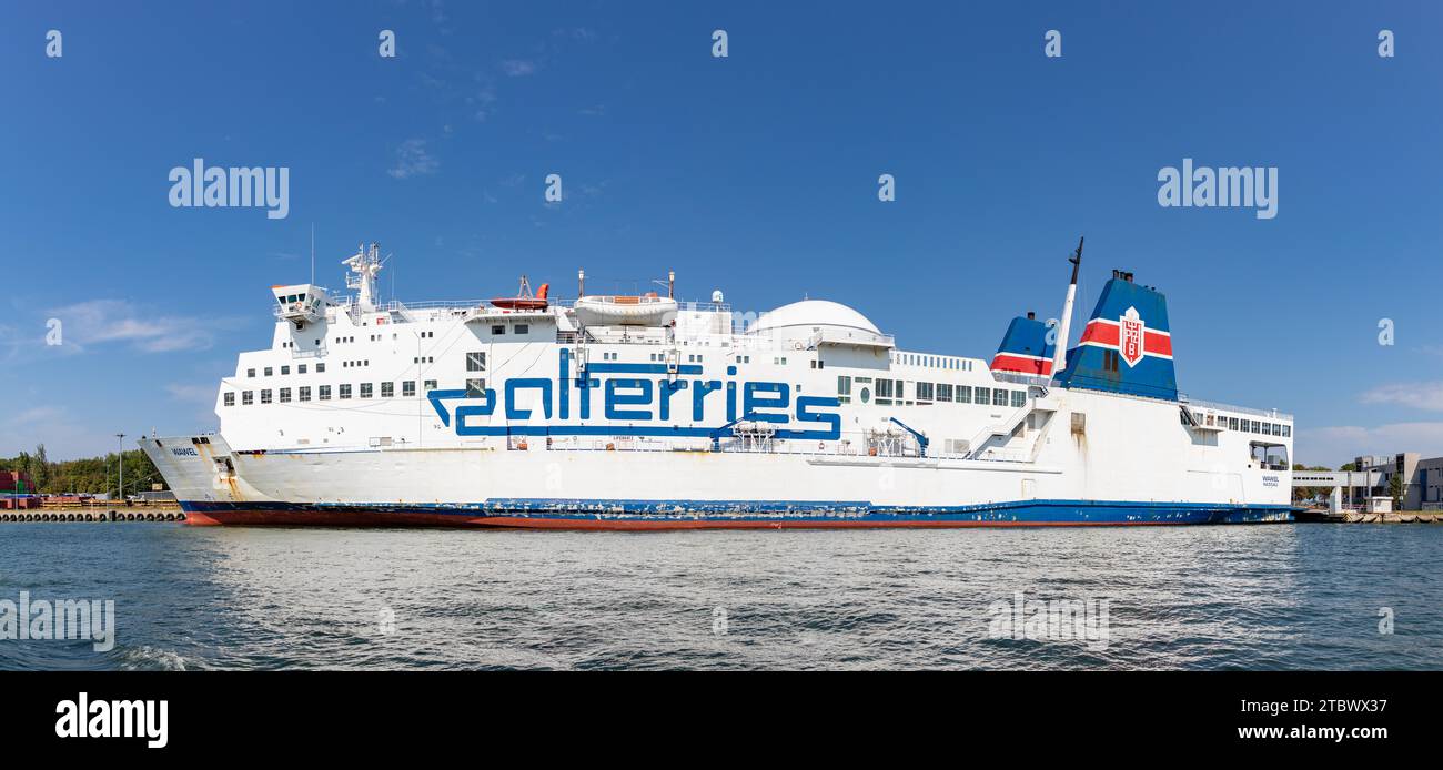 A picture of a large passenger and roll on-roll off cargo ship from Polferries docked in the Port of Gdansk Stock Photo