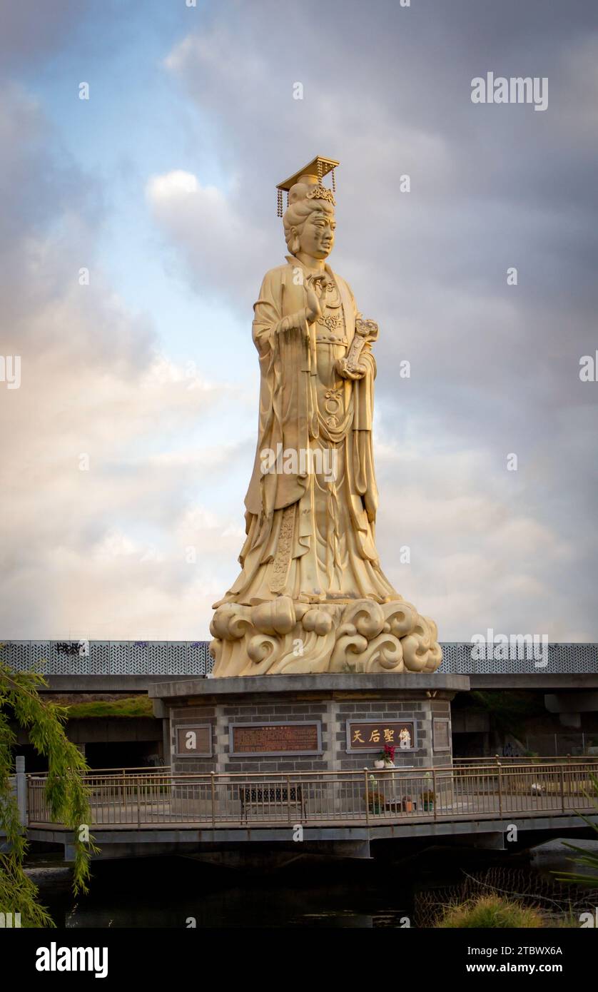 Huge statue in the Chinese temple China town Melbourne text on the