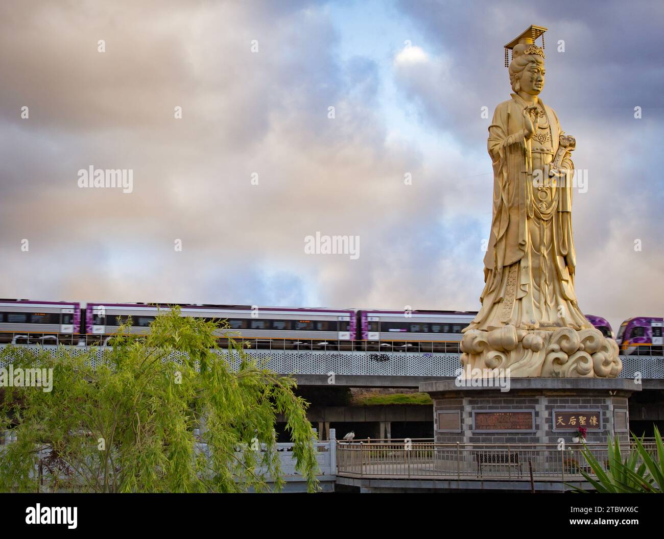 Huge statue in the Chinese temple China town Melbourne text on the