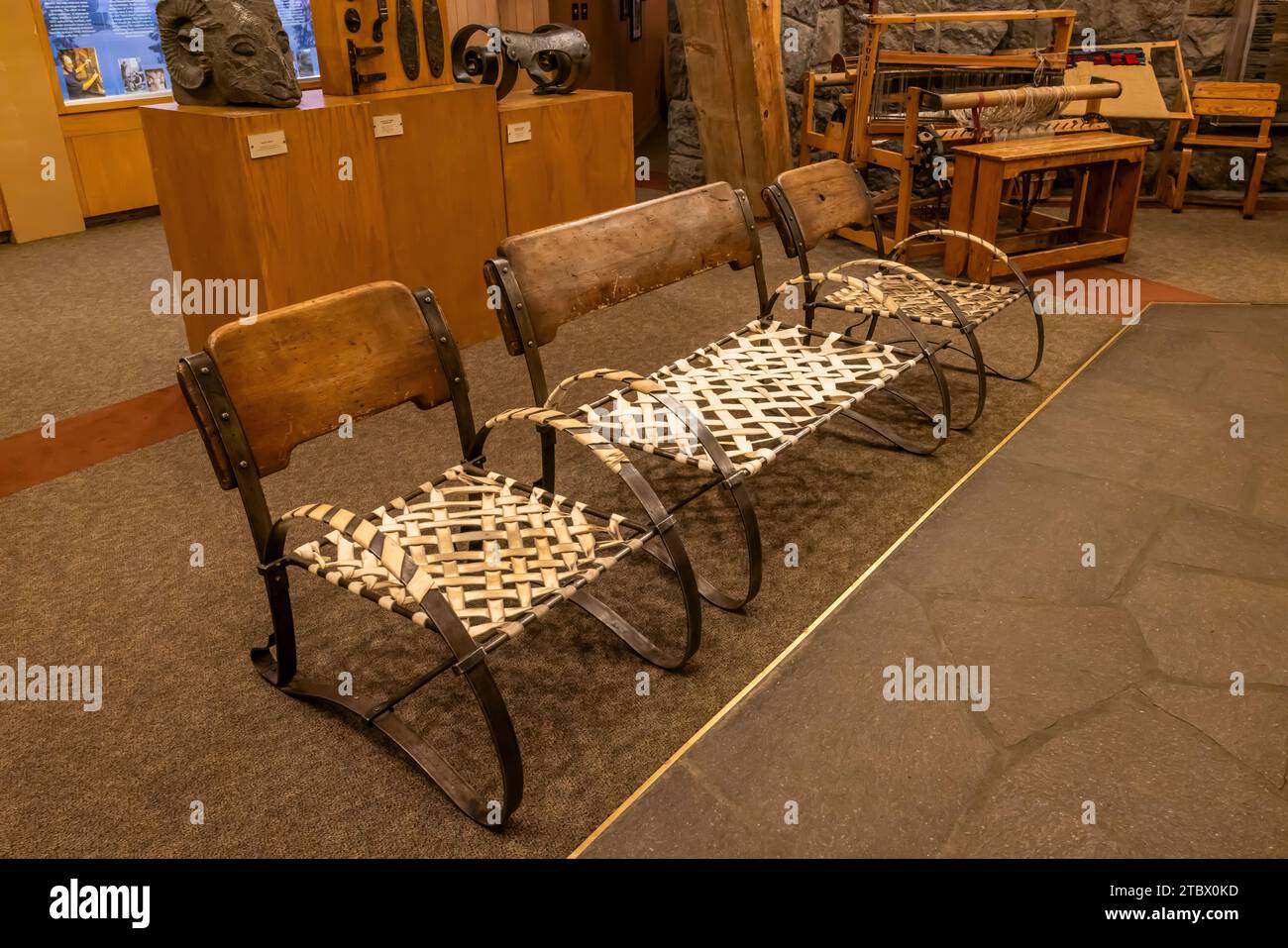 Woven rawhide chairs in warming area near entrance to Timberline Lodge ...