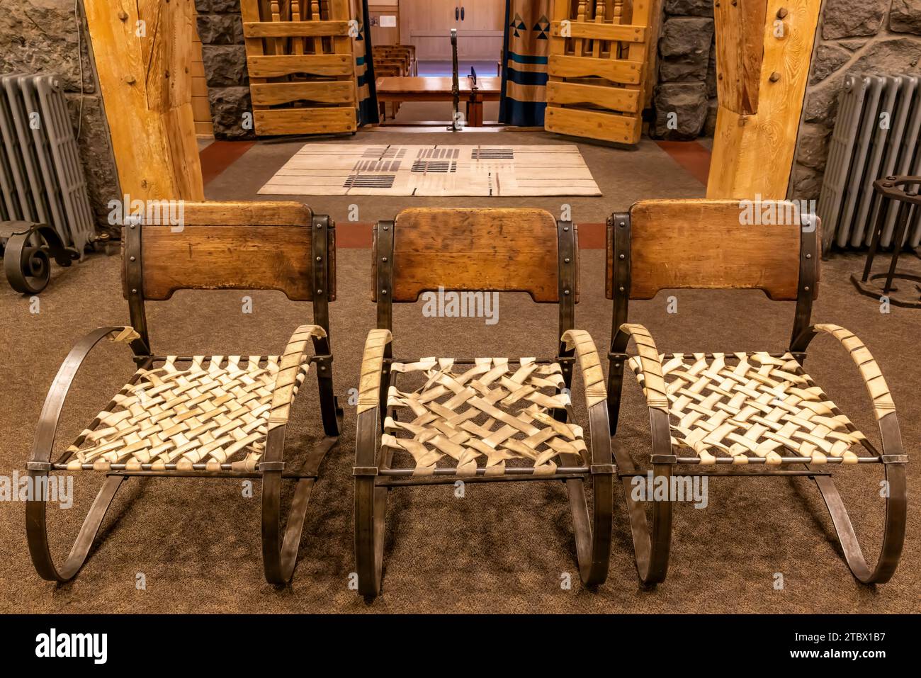 Woven rawhide chairs in warming area near entrance to Timberline Lodge ...