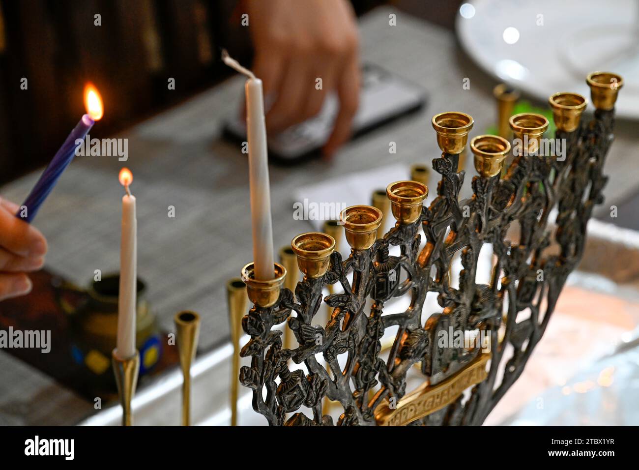 Beautiful Hannukah Jewish holiday scene lighting of the menorah