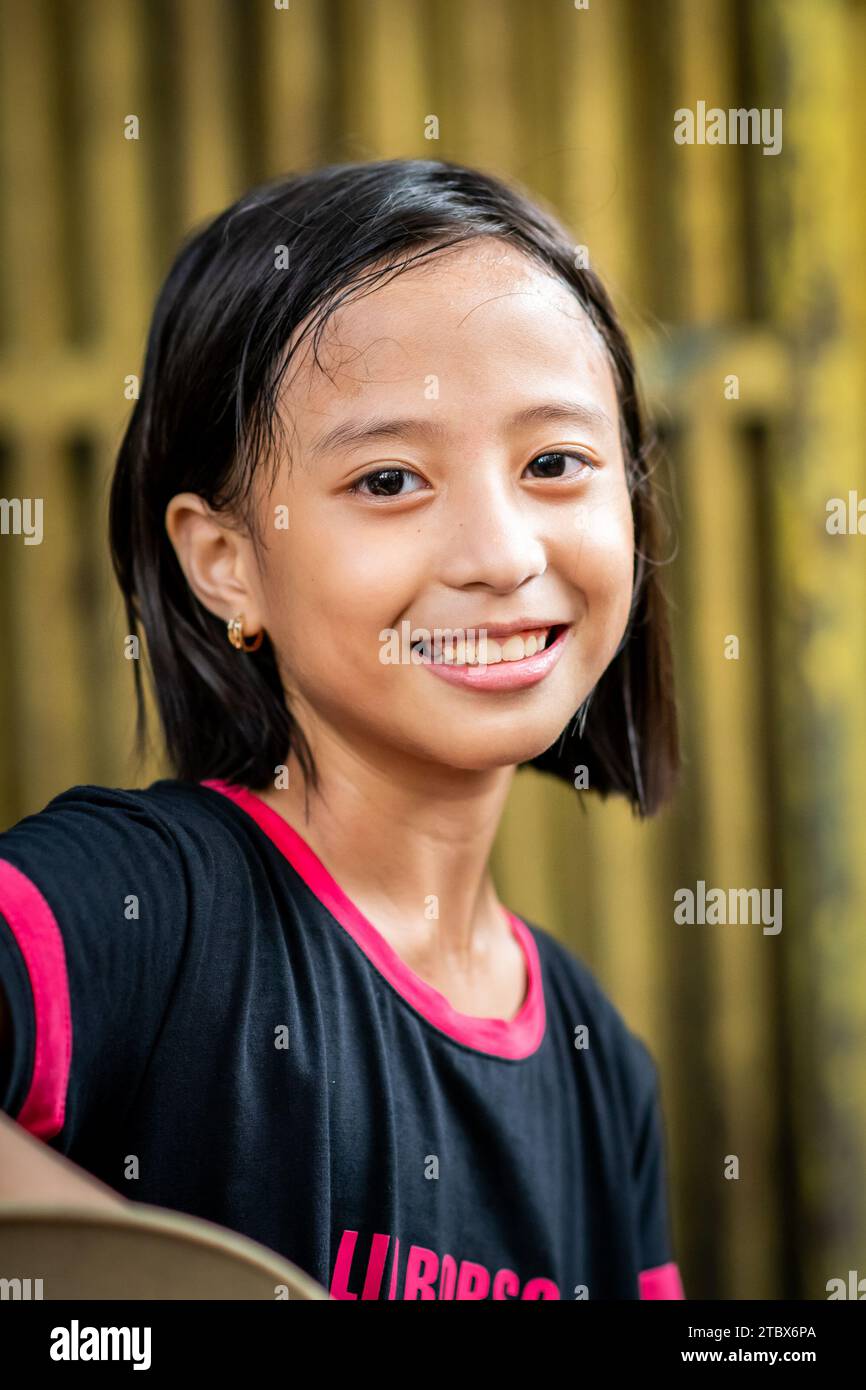 A Pretty Young Filipino Girl Poses For The Camera In Ermita, Manila ...