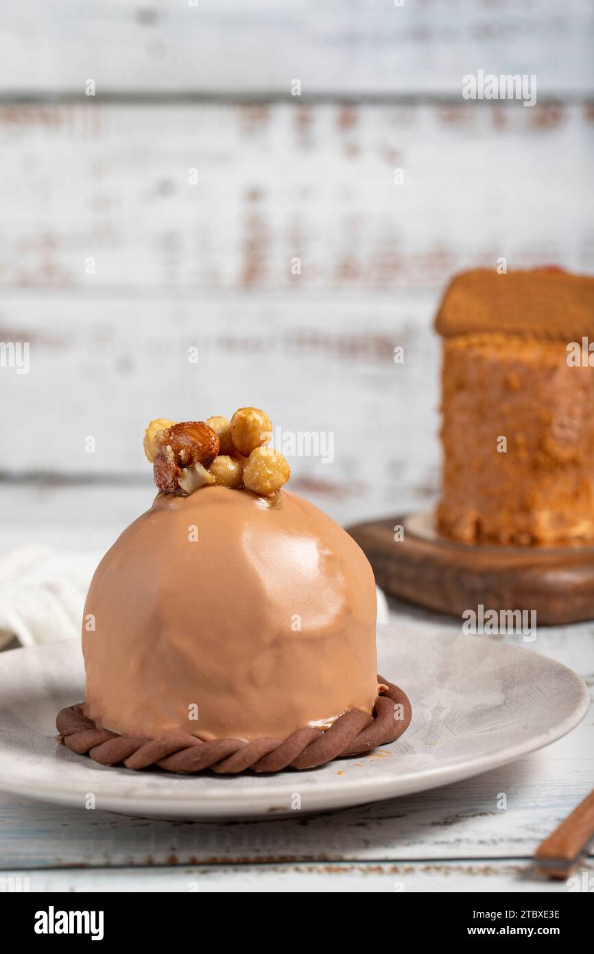 Chocolate cake. Delicious cream cake on a white background Stock Photo ...