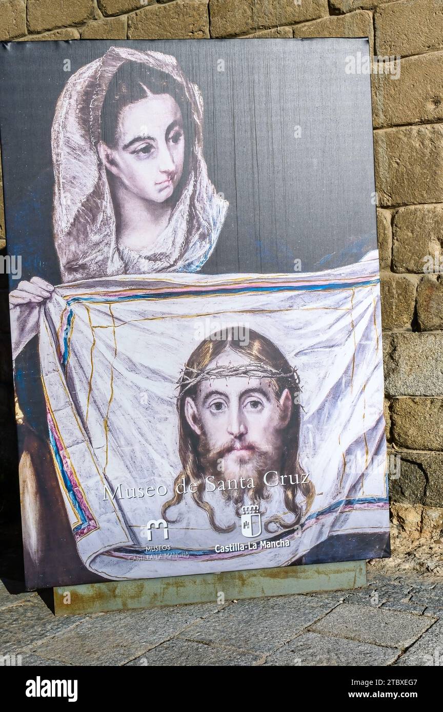 A textile object with the image of Jesus Christ leaning on a stone wall ...