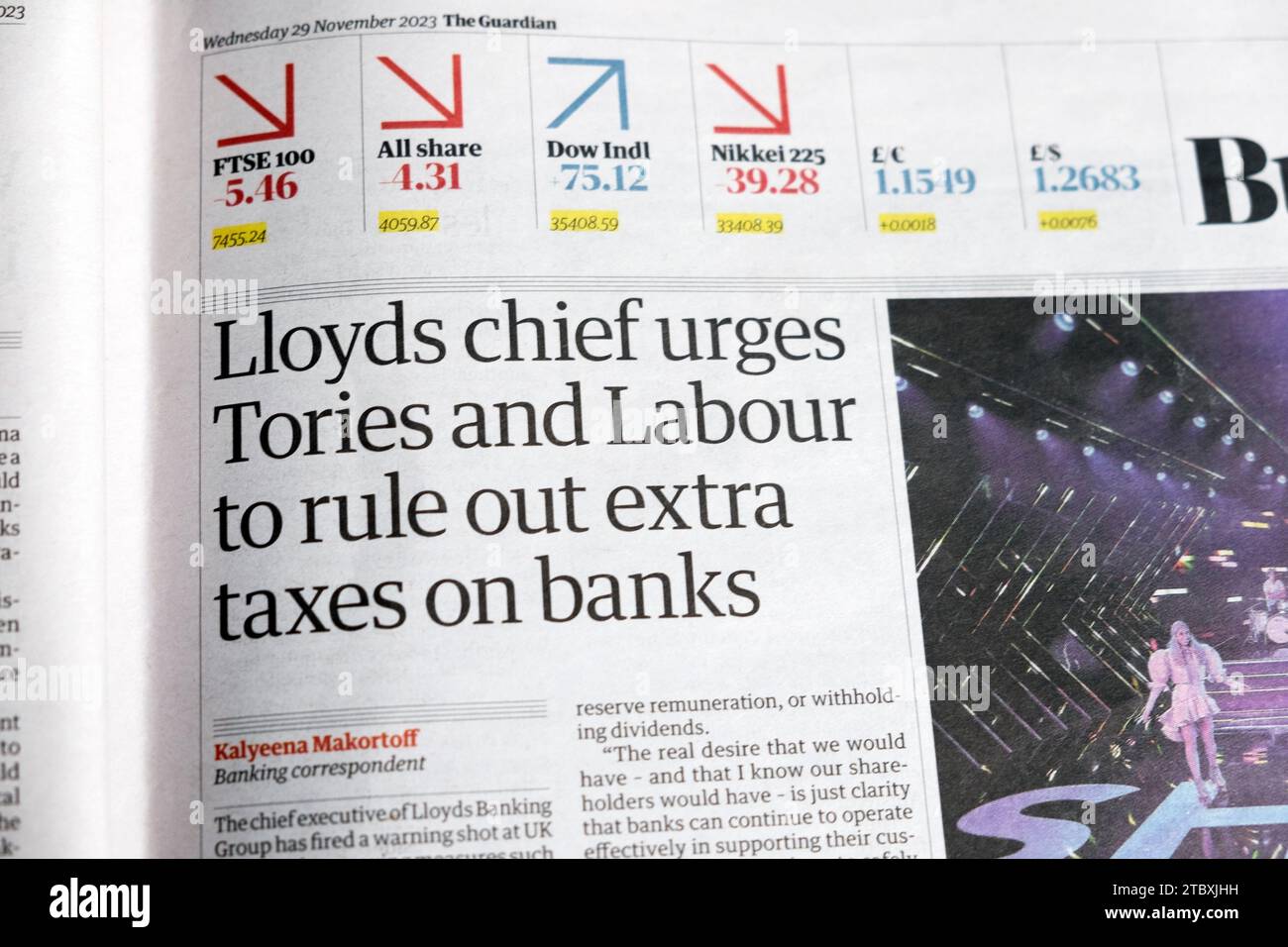 'Lloyds chief urges Tories and Labour to rule out extra taxes on banks' Guardian newspaper headline business article 29 November 2023 London UK Stock Photo